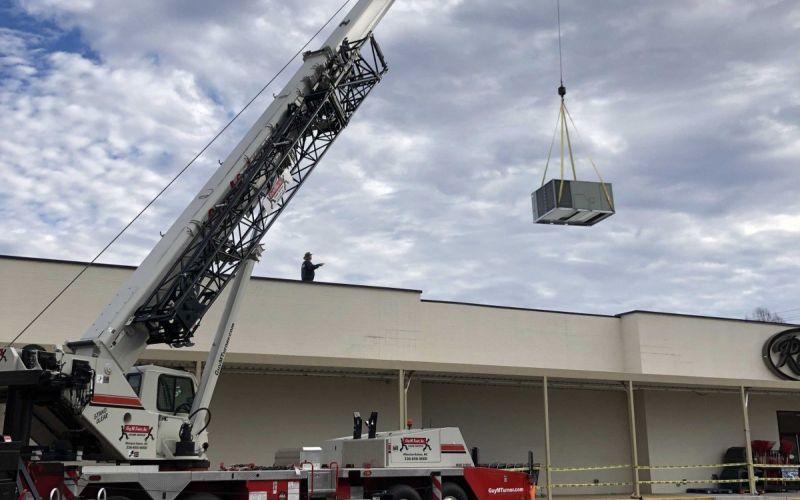 HVAC System lifted by crane